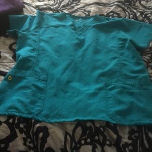 Three scrub tops